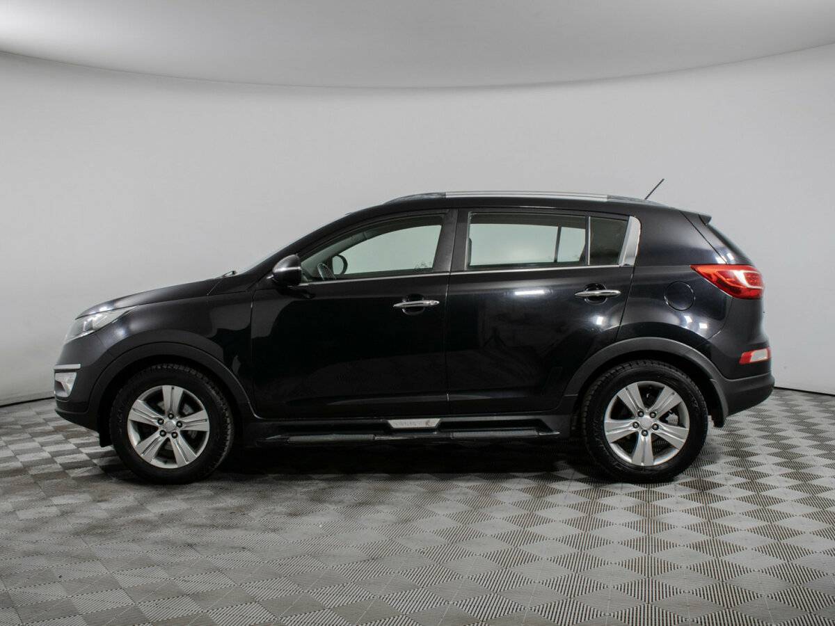 Kia Sportage с пробегом — 2011 год. Фото: #7