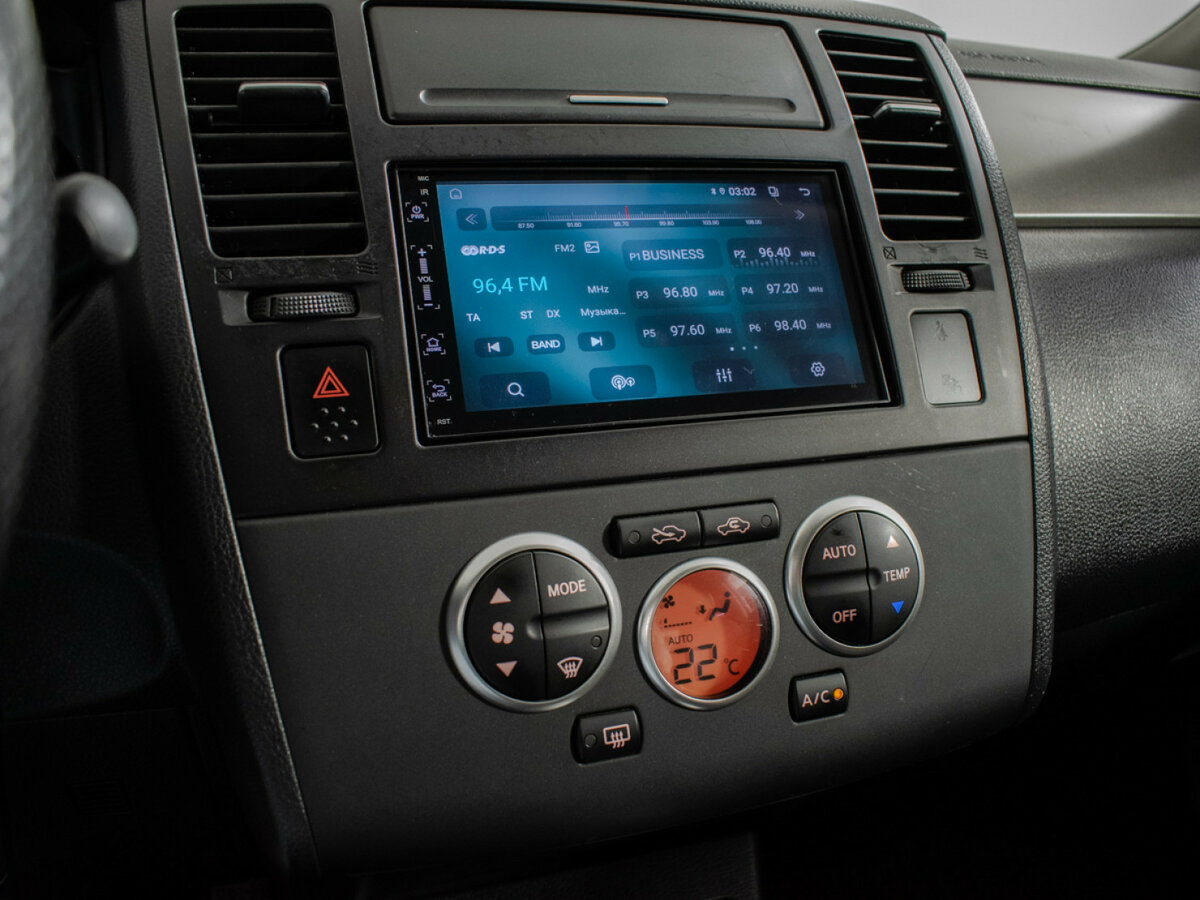 Nissan Tiida с пробегом — 2013 год. Фото: #12