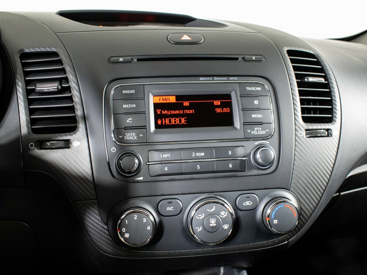 Kia Cerato с пробегом — 2015 год. Фото: #12