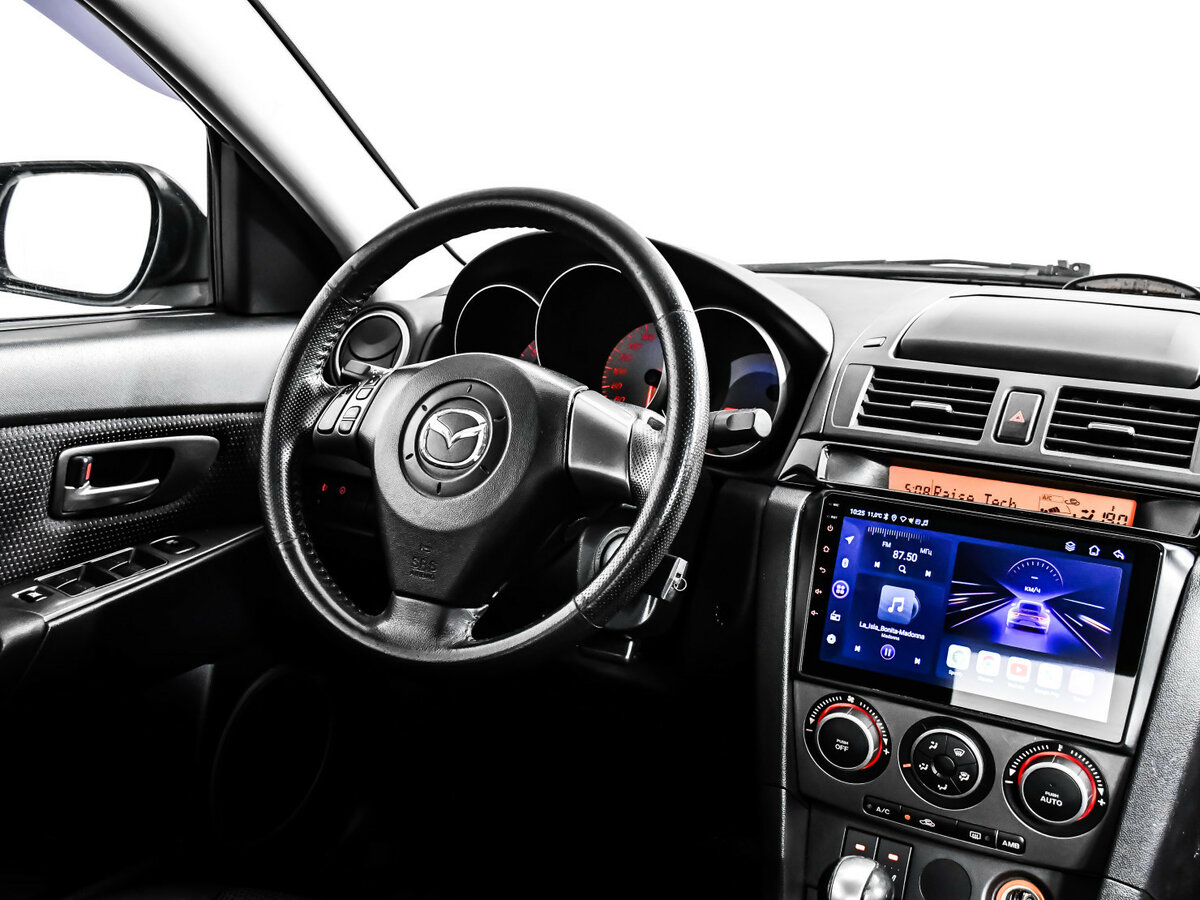Mazda 3 с пробегом — 2007 год. Фото: #6