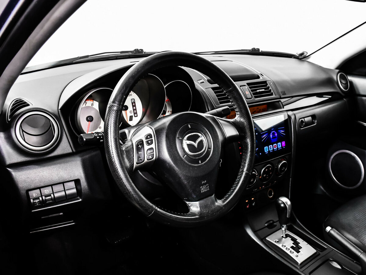 Mazda 3 с пробегом — 2007 год. Фото: #10