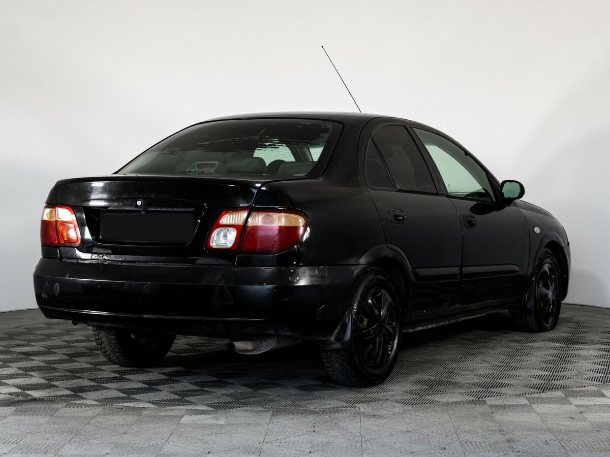 Nissan Almera с пробегом — 2005 год. Фото: #3