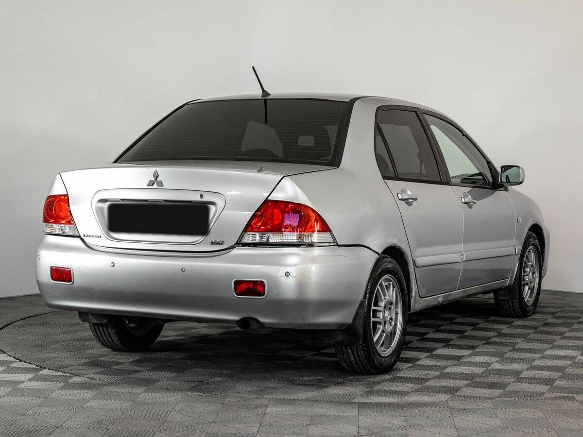 Mitsubishi Lancer с пробегом — 2006 год. Фото: #3