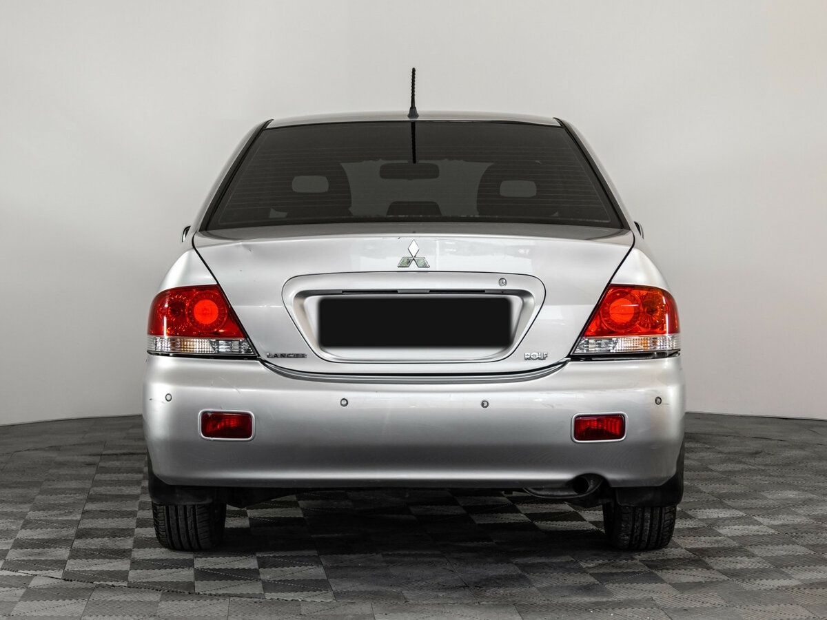 Mitsubishi Lancer с пробегом — 2006 год. Фото: #4
