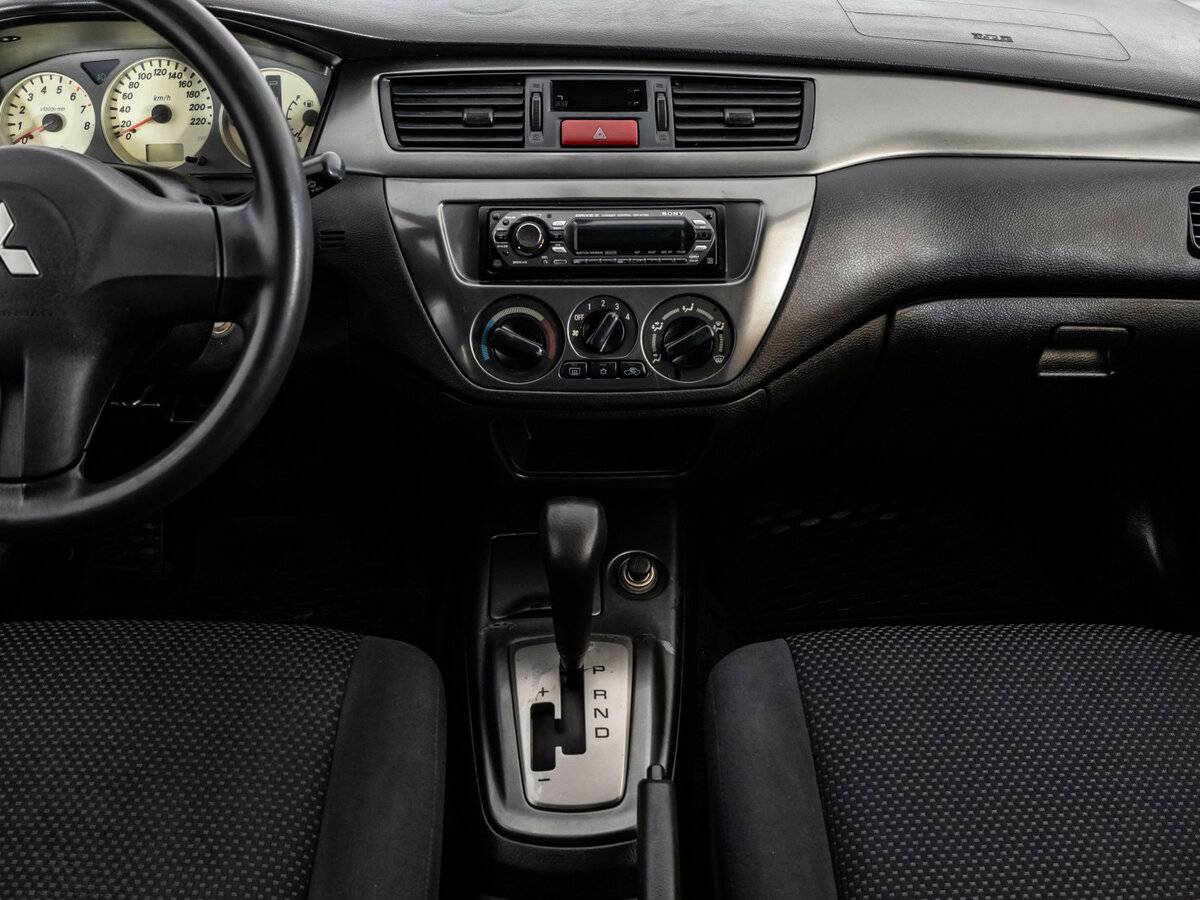 Mitsubishi Lancer с пробегом — 2006 год. Фото: #8