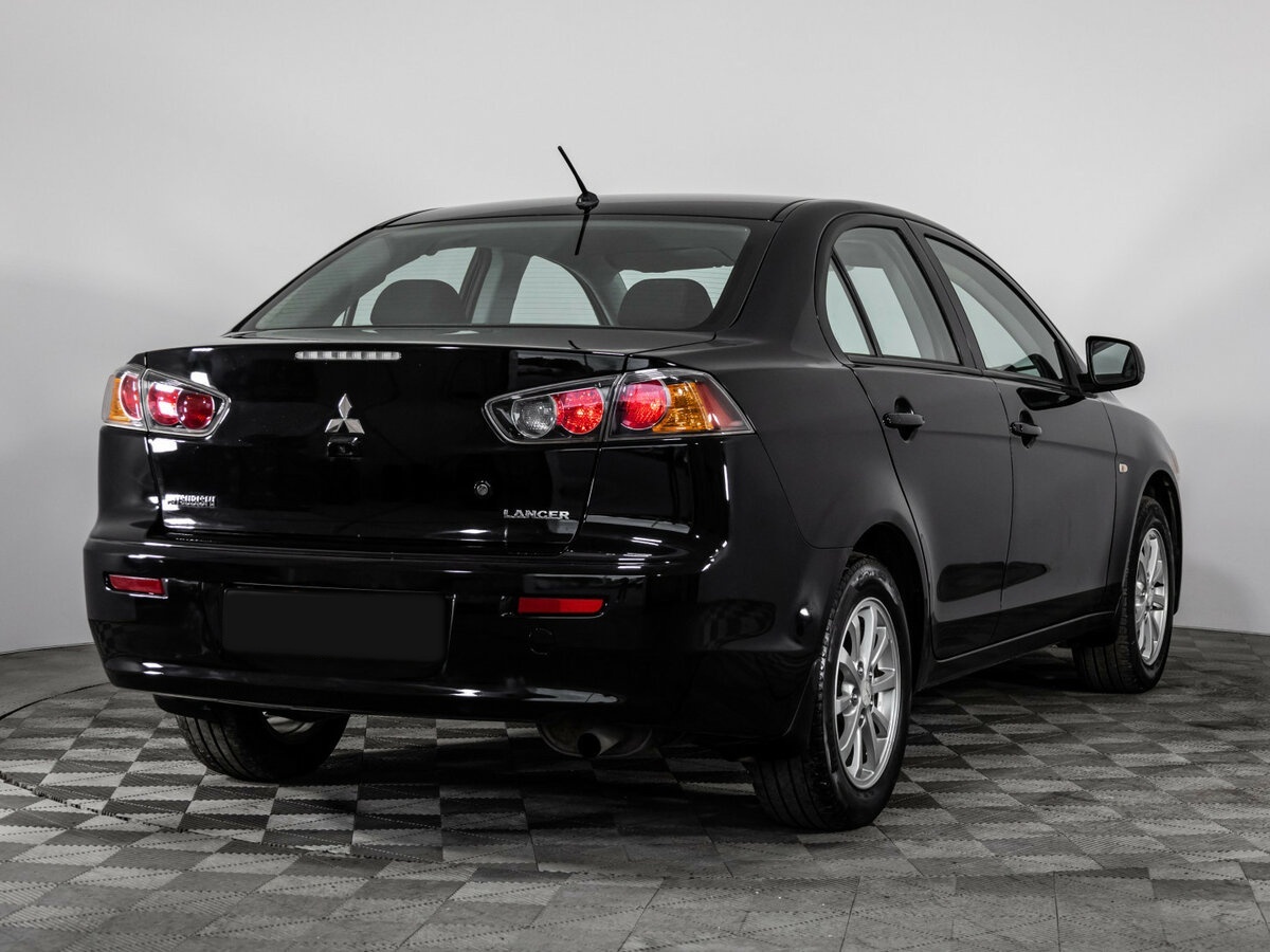 Mitsubishi Lancer с пробегом — 2012 год. Фото: #3
