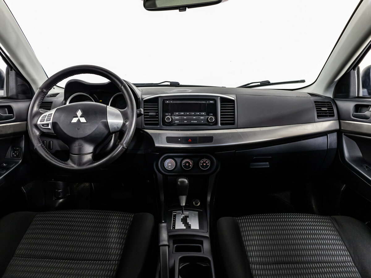 Mitsubishi Lancer с пробегом — 2012 год. Фото: #7