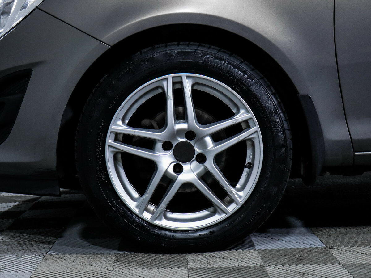 Opel Corsa с пробегом — 2011 год. Фото: #11