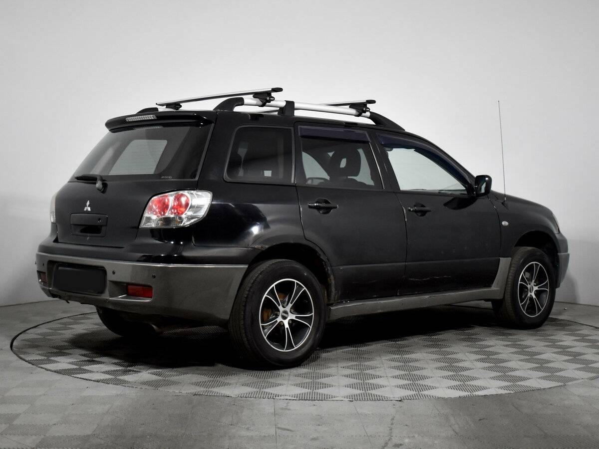 Mitsubishi Outlander с пробегом — 2002 год. Фото: #3