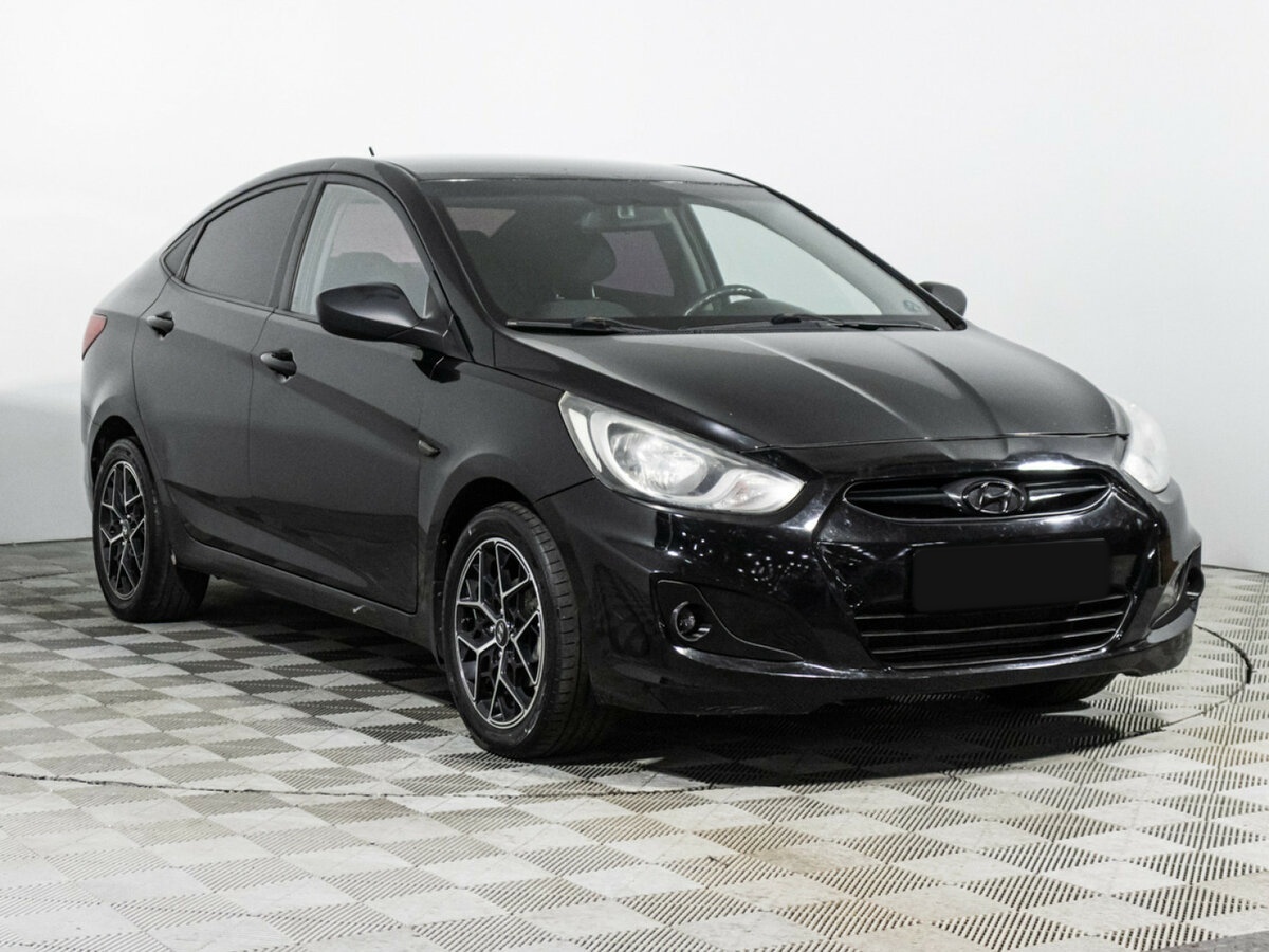 Hyundai Solaris с пробегом — 2011 год. Фото: #2