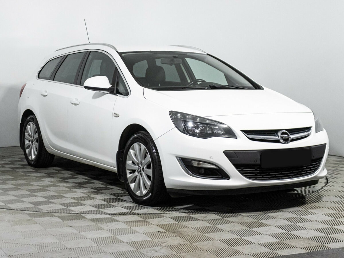 Opel Astra с пробегом — 2014 год. Фото: #2