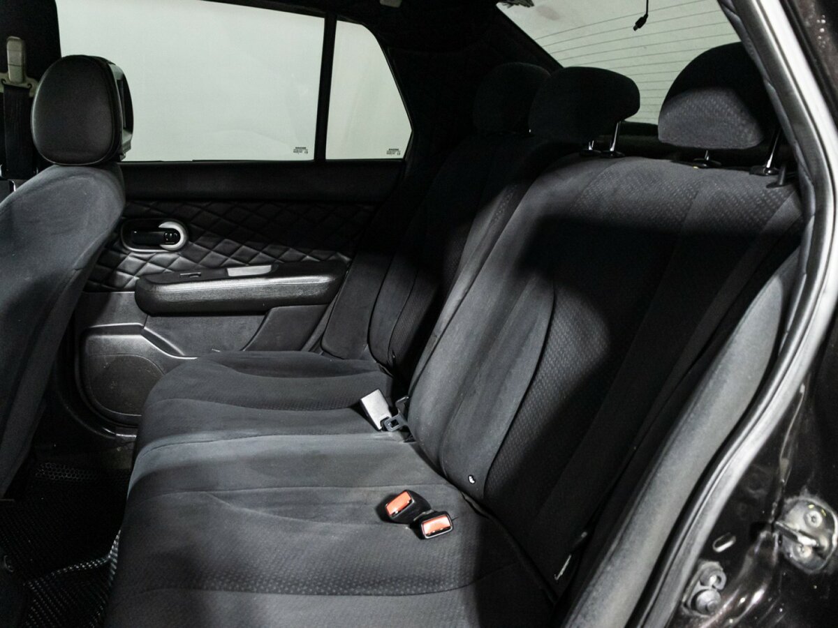 Nissan Tiida с пробегом — 2010 год. Фото: #9