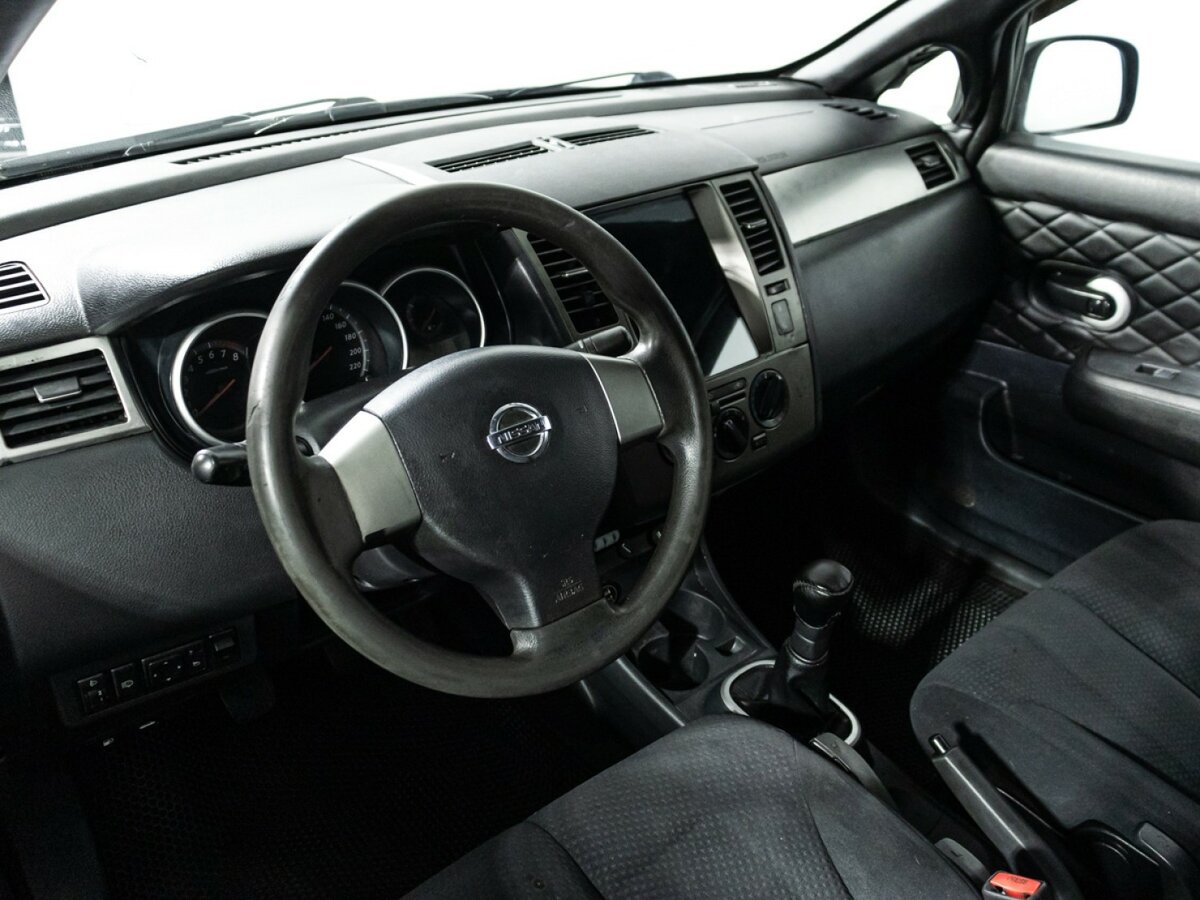 Nissan Tiida с пробегом — 2010 год. Фото: #10