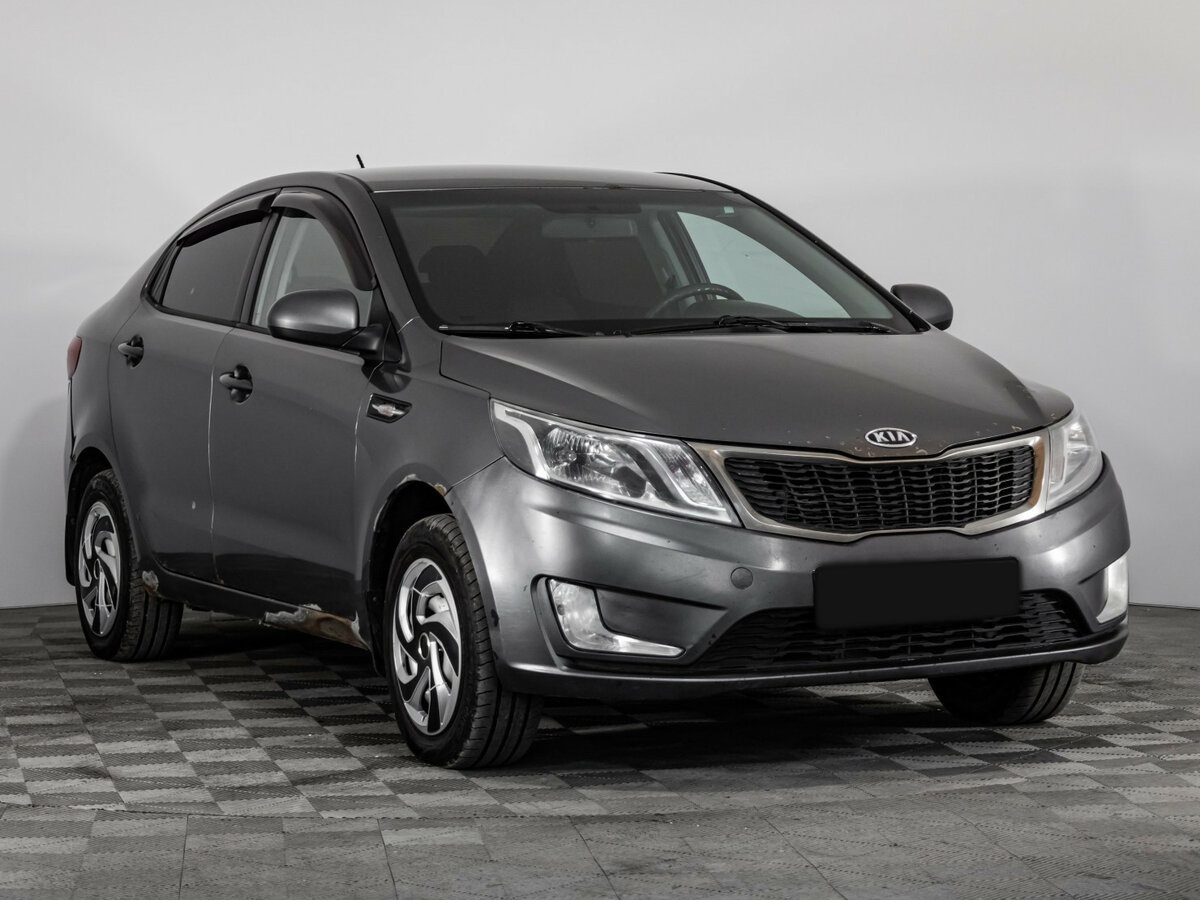 Kia Rio с пробегом — 2011 год. Фото: #2