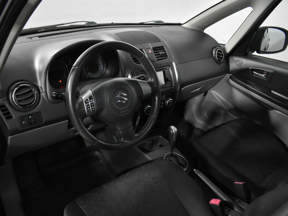 Suzuki SX4 с пробегом — 2011 год. Фото: #7