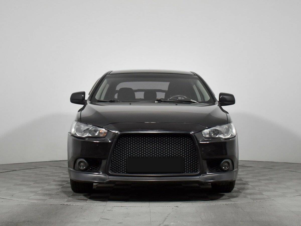 Mitsubishi Lancer с пробегом — 2011 год. Фото: #1