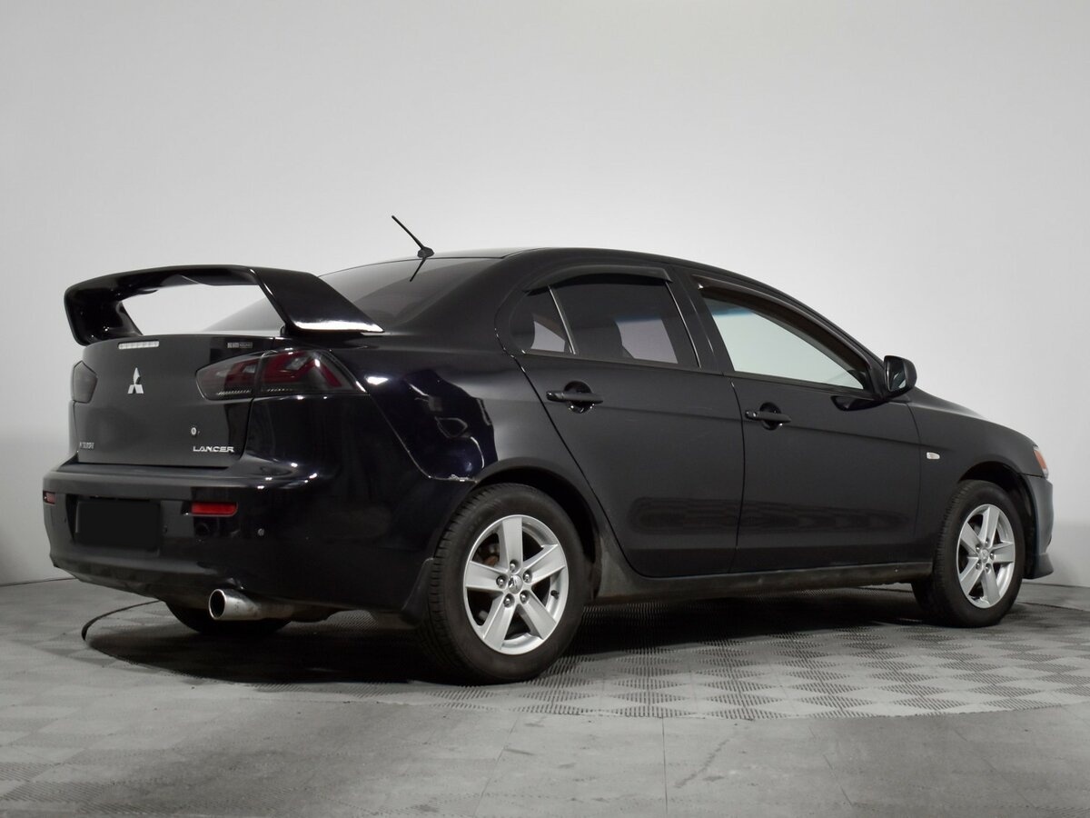 Mitsubishi Lancer с пробегом — 2011 год. Фото: #3