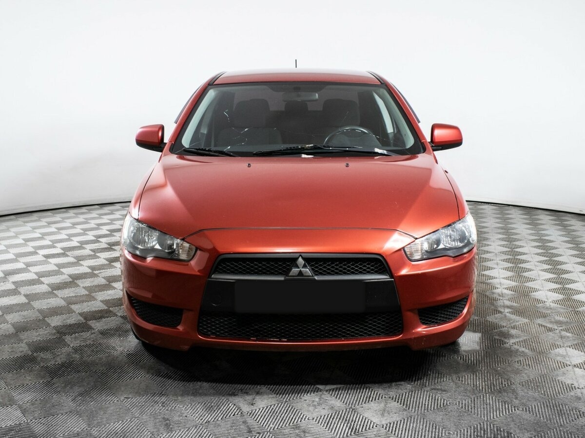 Mitsubishi Lancer с пробегом — 2010 год. Фото: #1