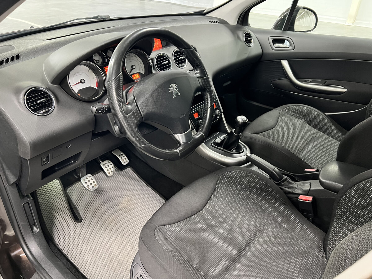 Peugeot 308 с пробегом — 2012 год. Фото: #14