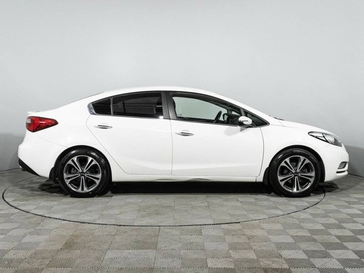 Kia Cerato с пробегом — 2015 год. Фото: #3