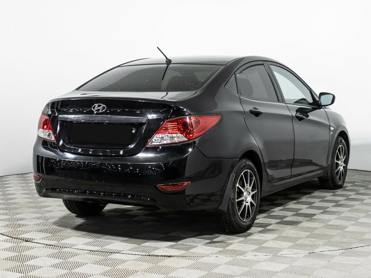 Hyundai Solaris с пробегом — 2011 год. Фото: #4