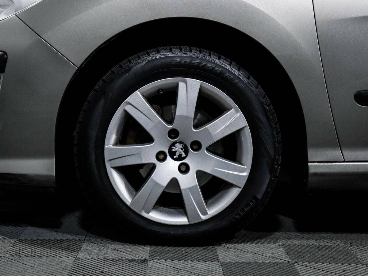 Peugeot 308 с пробегом — 2011 год. Фото: #11