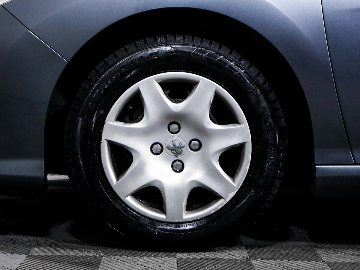 Peugeot 308 с пробегом — 2011 год. Фото: #12