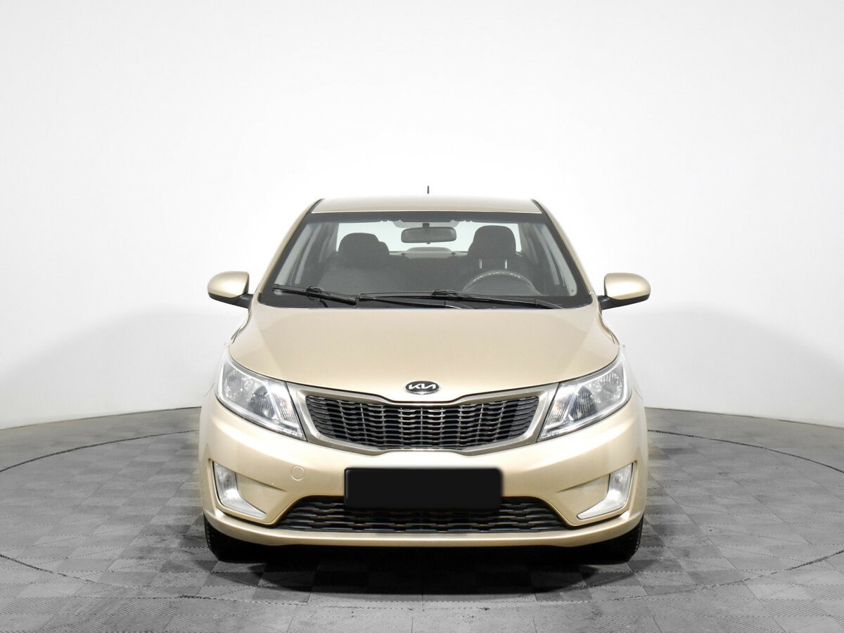 Kia Rio с пробегом — 2011 год. Фото: #1