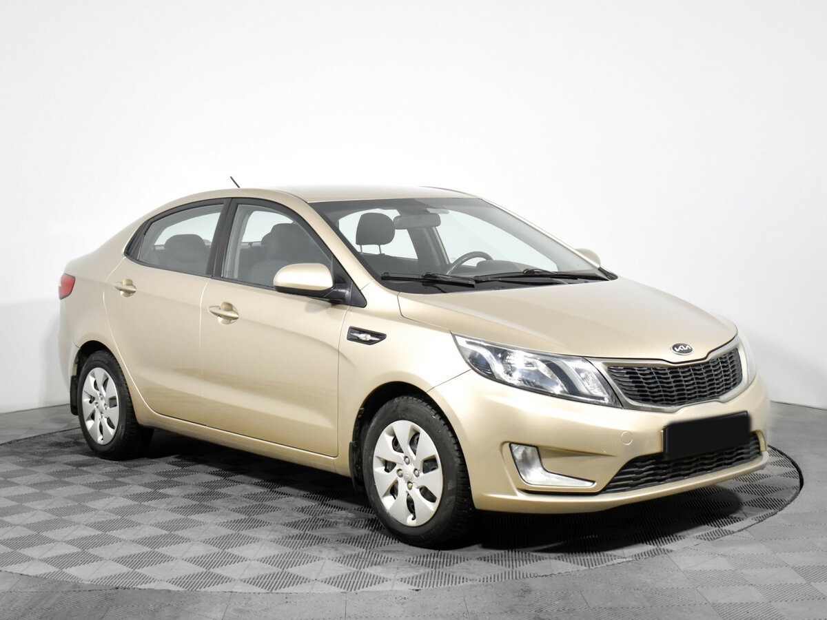 Kia Rio с пробегом — 2011 год. Фото: #2