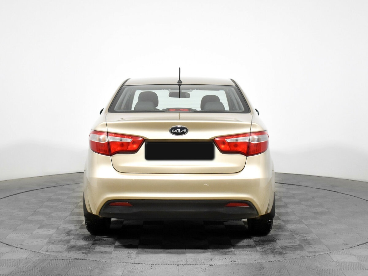 Kia Rio с пробегом — 2011 год. Фото: #5