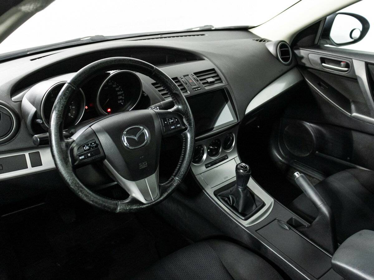 Mazda 3 с пробегом — 2010 год. Фото: #10