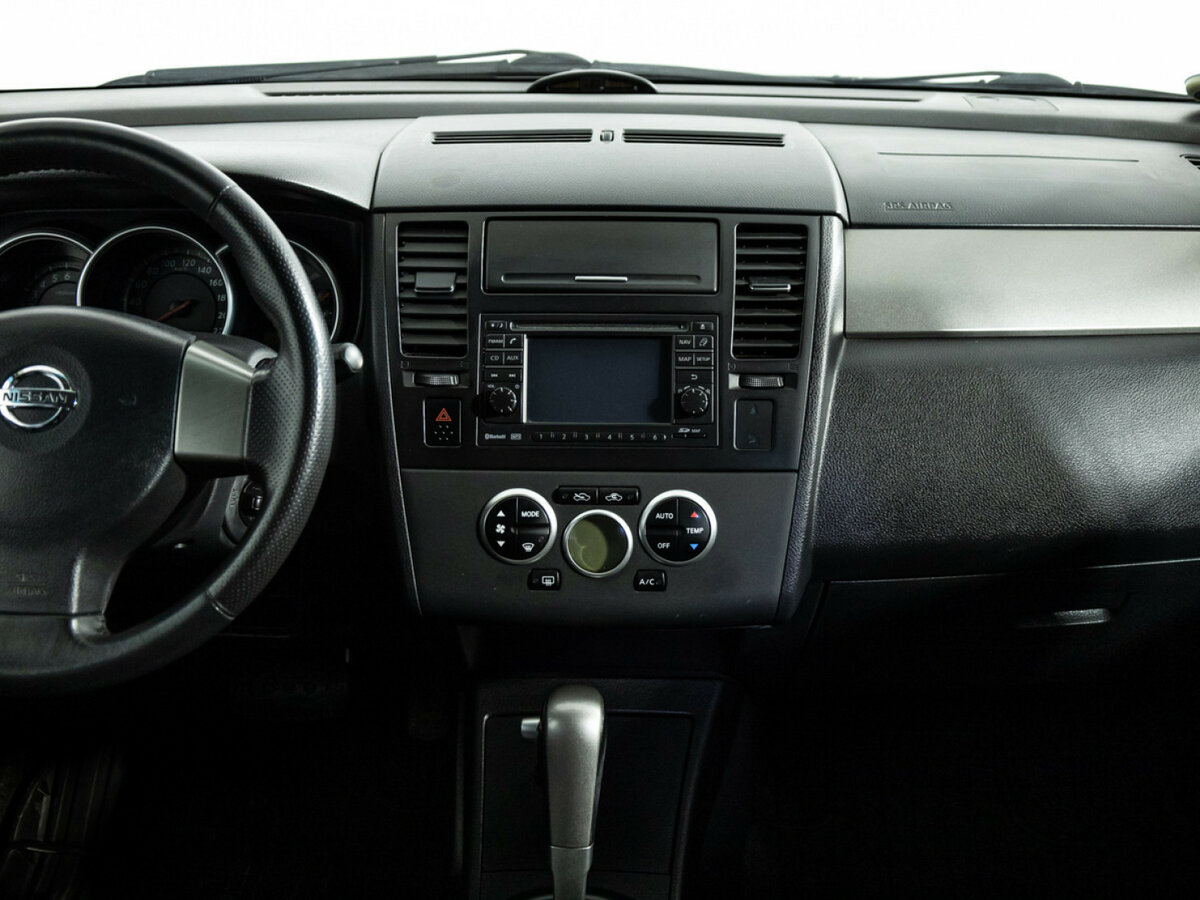 Nissan Tiida с пробегом — 2010 год. Фото: #13
