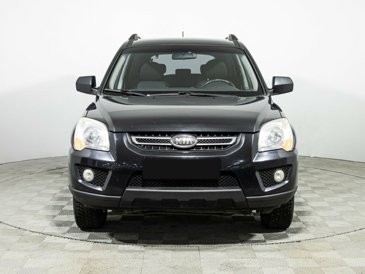 Kia Sportage с пробегом — 2009 год. Фото: #1