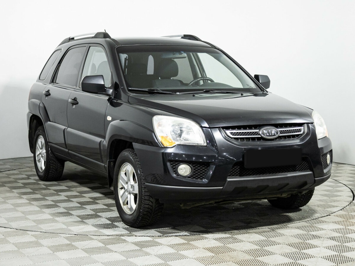 Kia Sportage с пробегом — 2009 год. Фото: #2