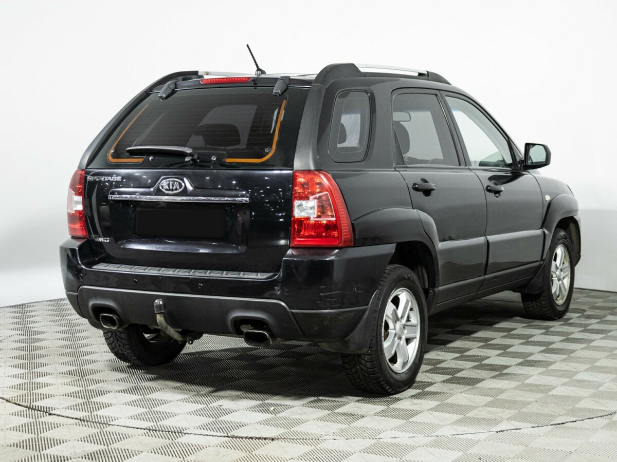 Kia Sportage с пробегом — 2009 год. Фото: #4
