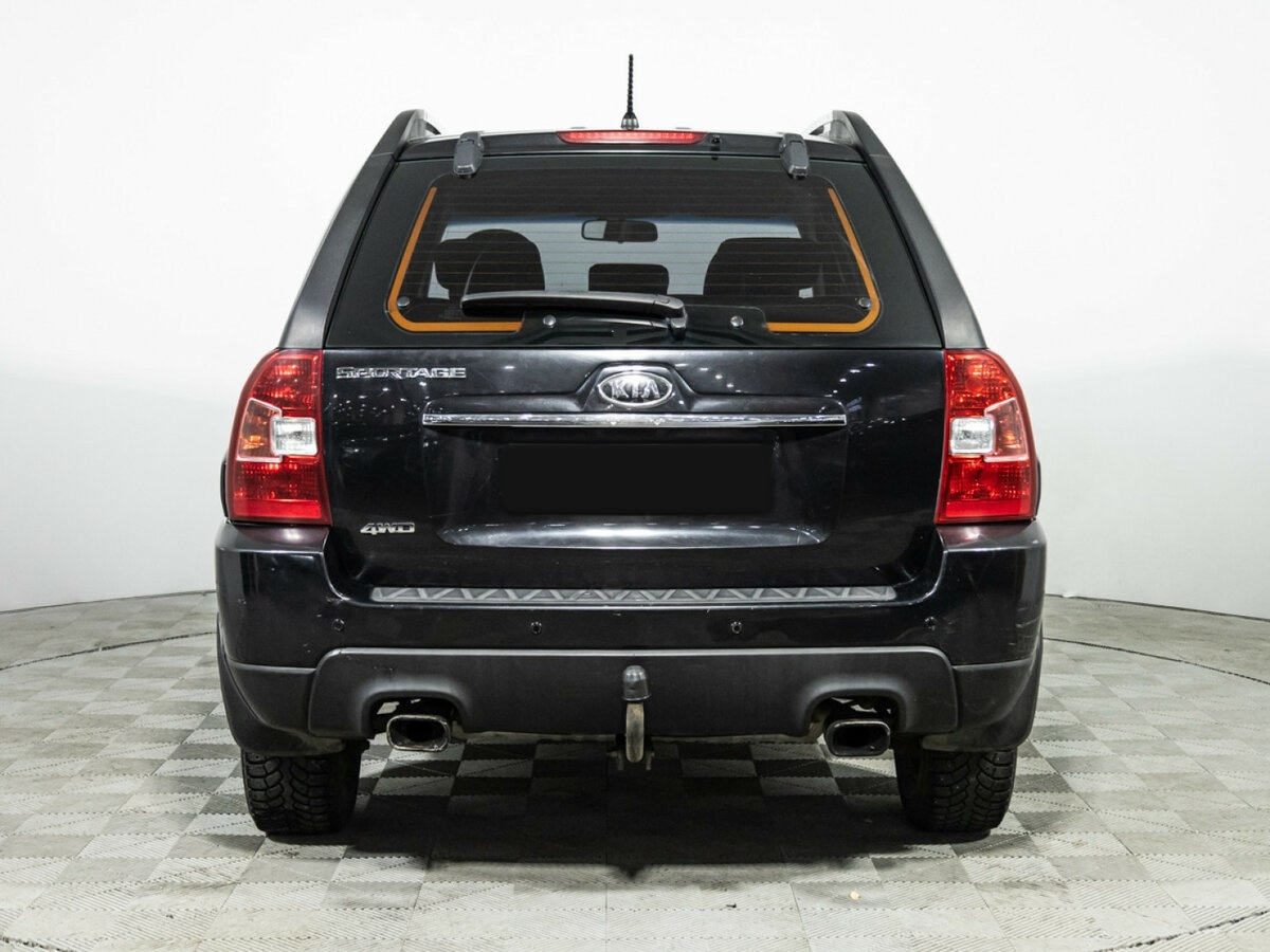 Kia Sportage с пробегом — 2009 год. Фото: #5
