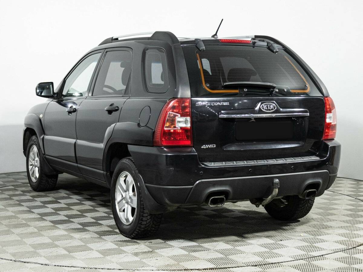 Kia Sportage с пробегом — 2009 год. Фото: #6