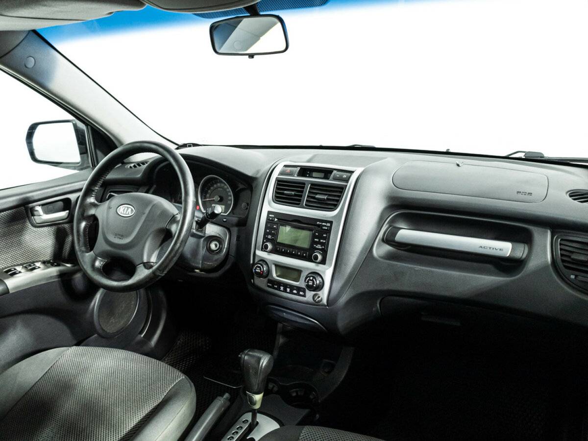 Kia Sportage с пробегом — 2009 год. Фото: #8
