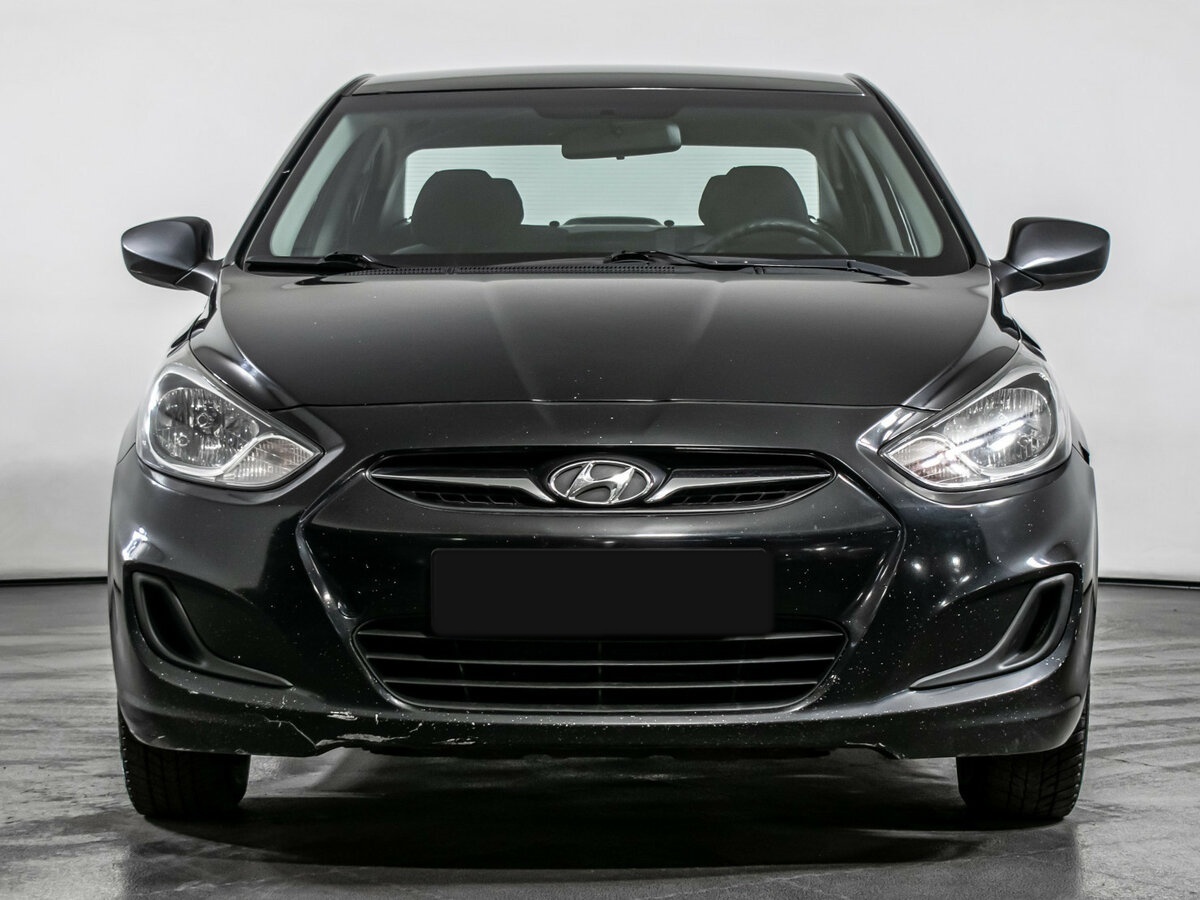 Hyundai Solaris с пробегом — 2011 год. Фото: #1