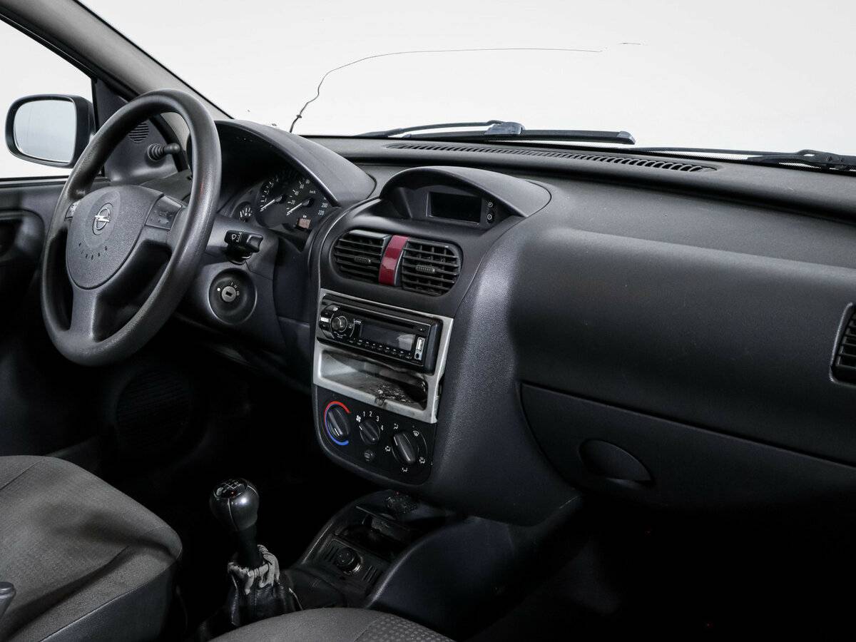Opel Corsa с пробегом — 2004 год. Фото: #6