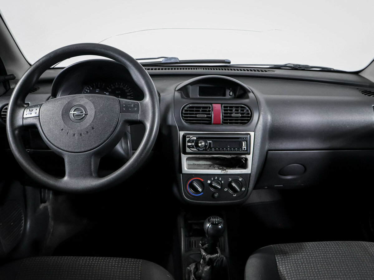 Opel Corsa с пробегом — 2004 год. Фото: #9