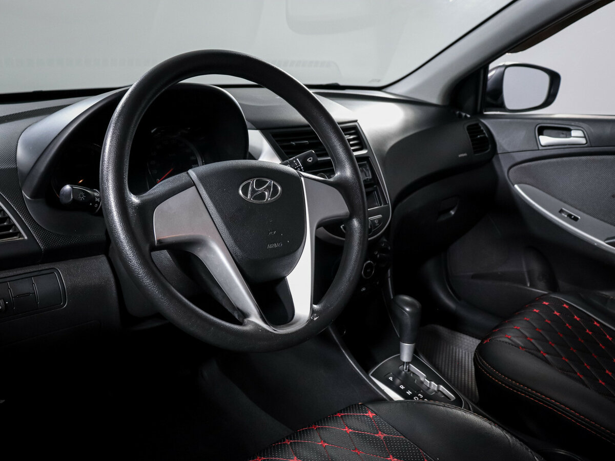 Hyundai Solaris с пробегом — 2013 год. Фото: #11