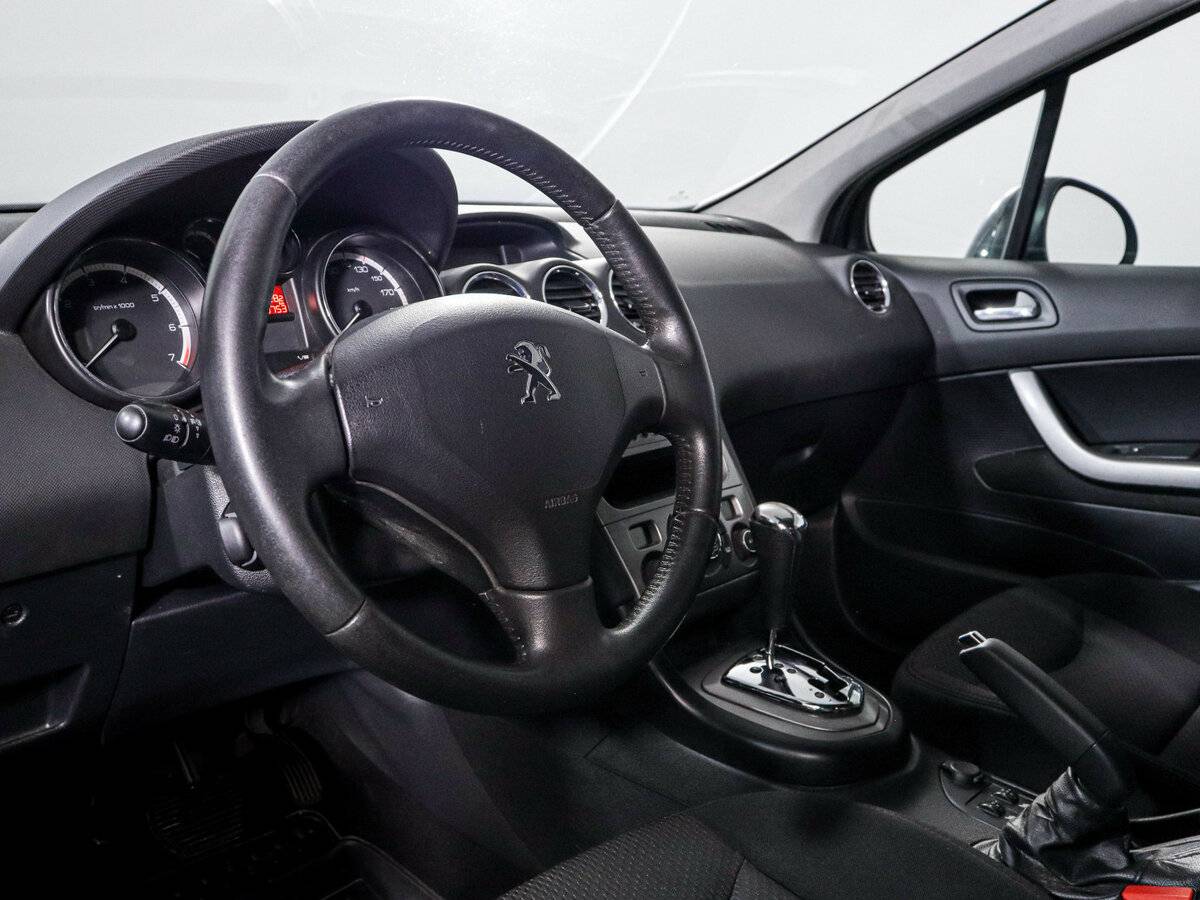 Peugeot 408 с пробегом — 2012 год. Фото: #12