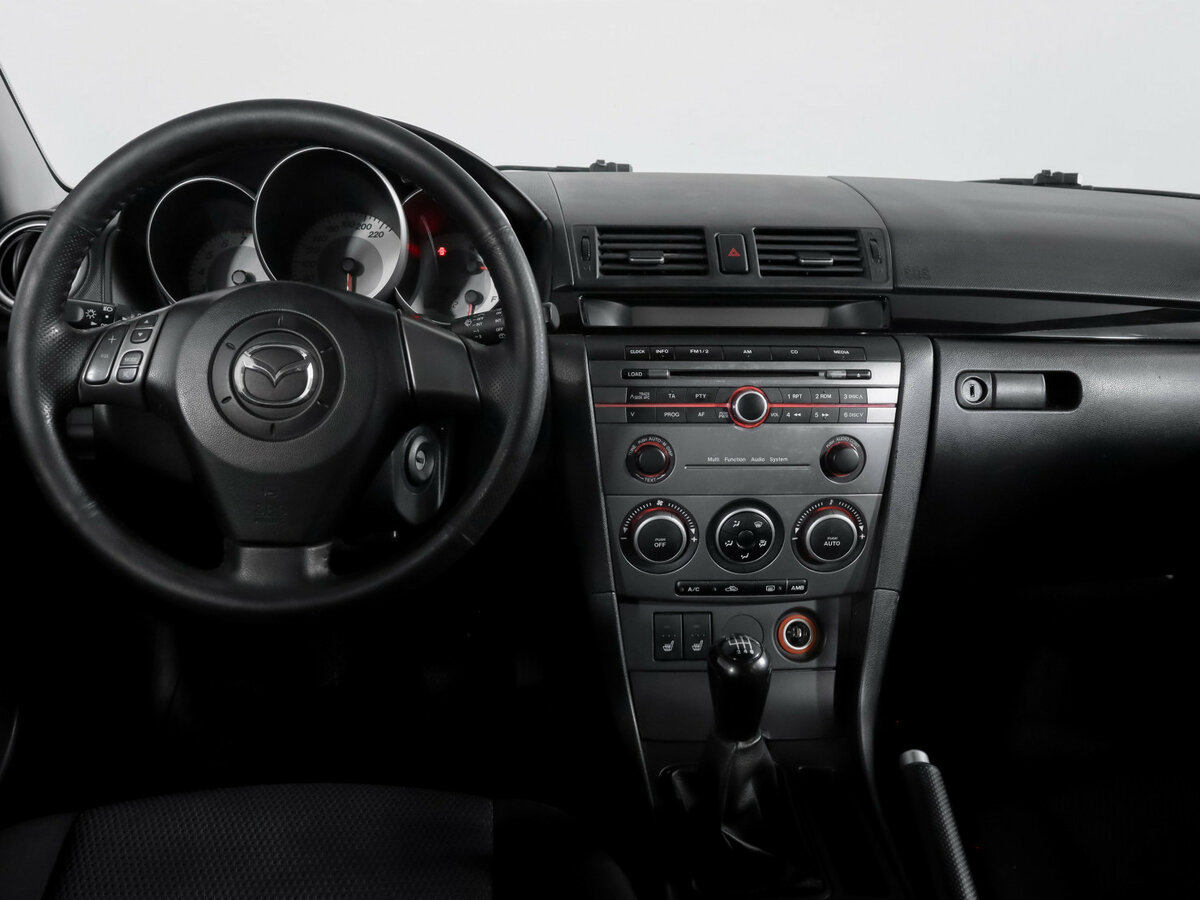 Mazda 3 с пробегом — 2007 год. Фото: #7