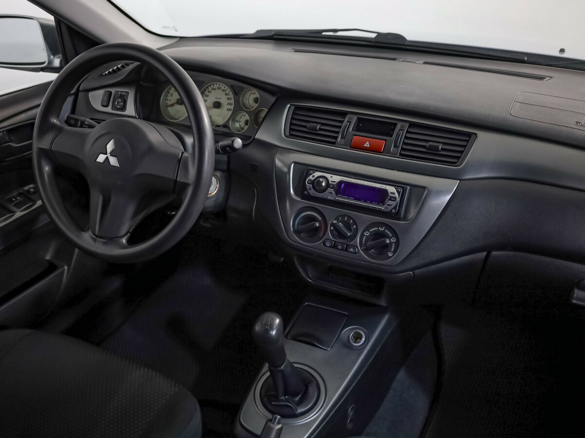 Mitsubishi Lancer с пробегом — 2006 год. Фото: #6