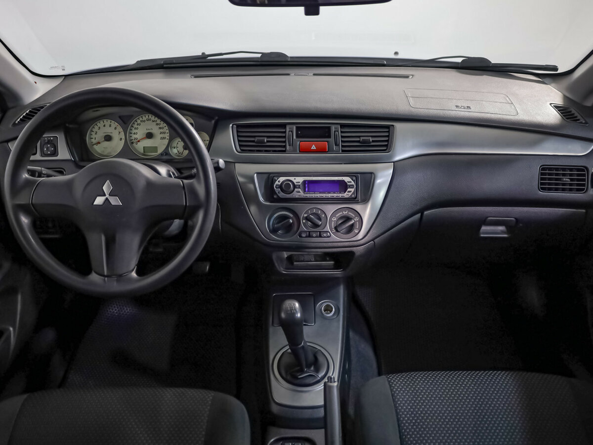 Mitsubishi Lancer с пробегом — 2006 год. Фото: #7