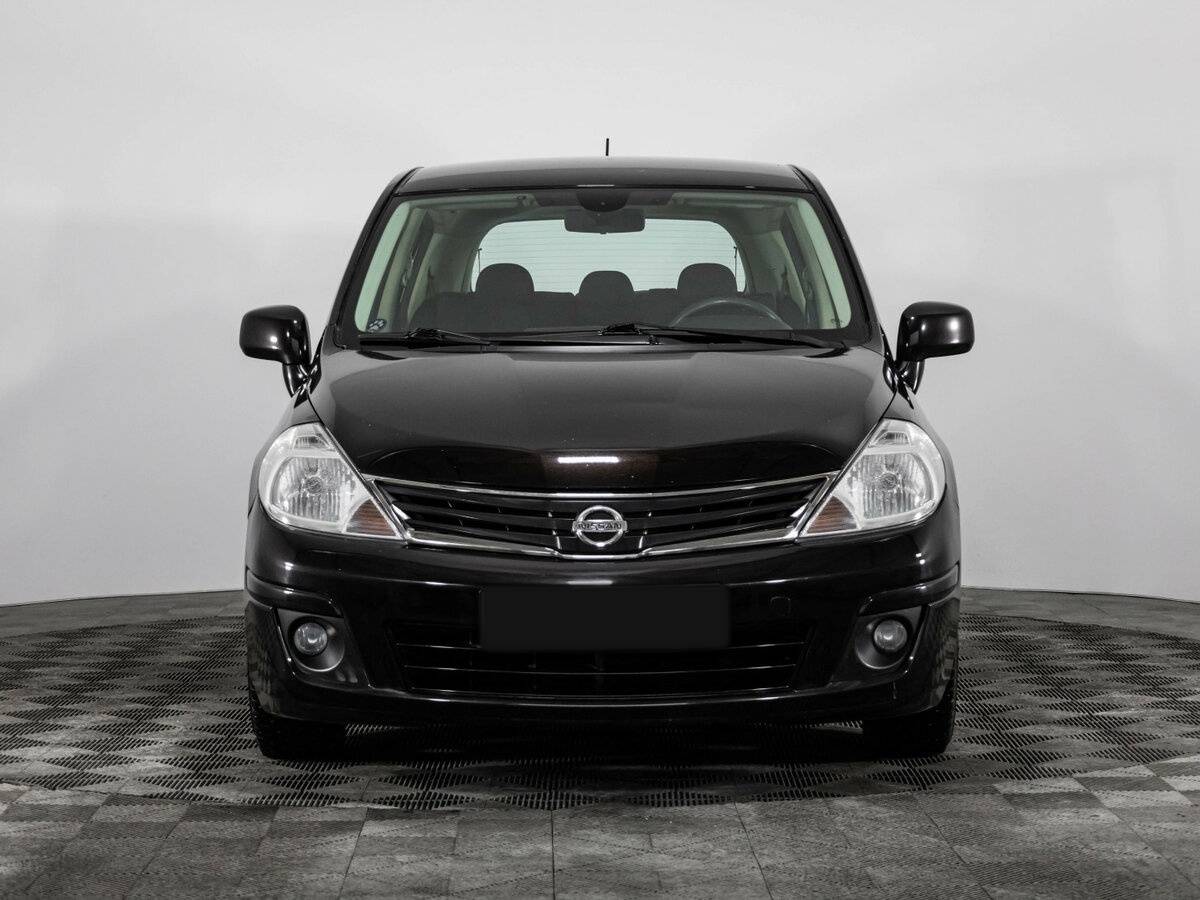 Nissan Tiida с пробегом — 2010 год. Фото: #1
