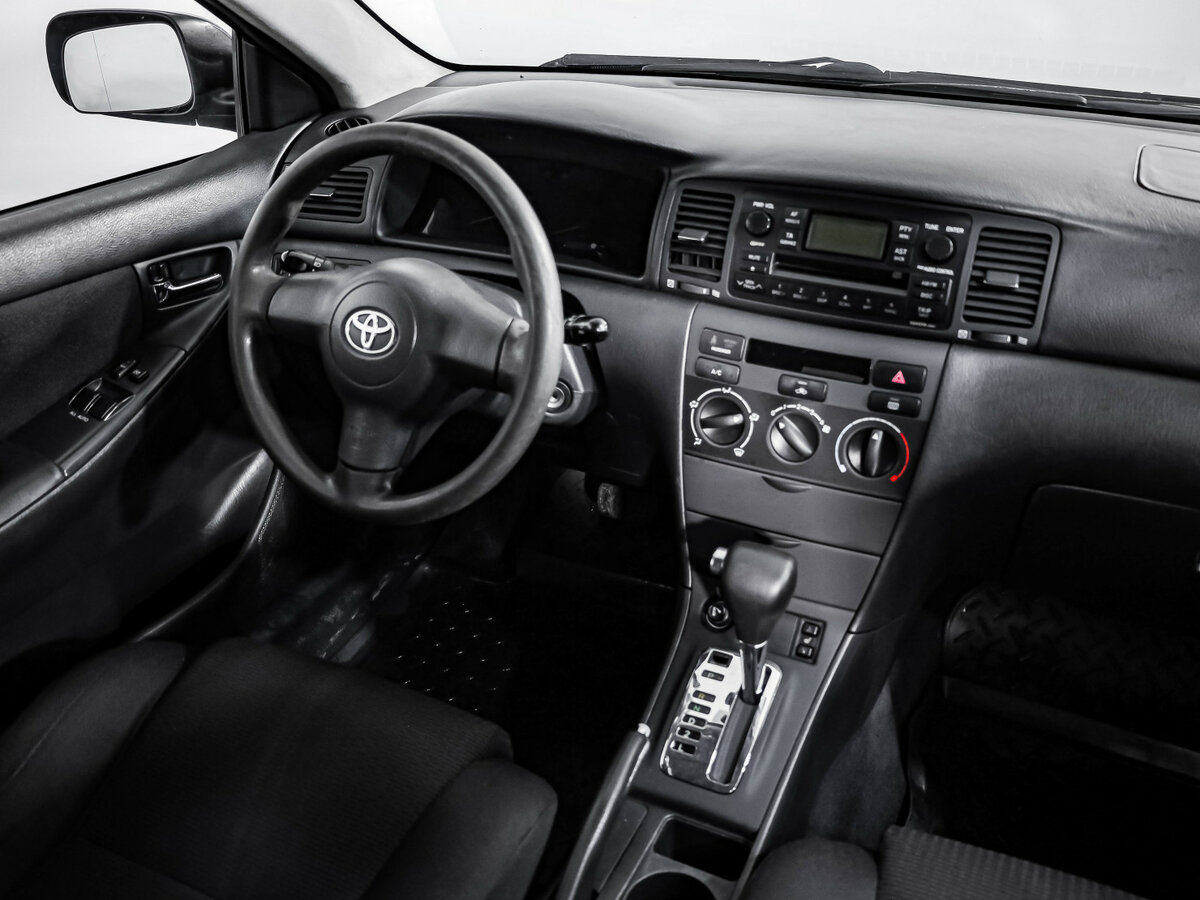 Toyota Corolla с пробегом — 2006 год. Фото: #6