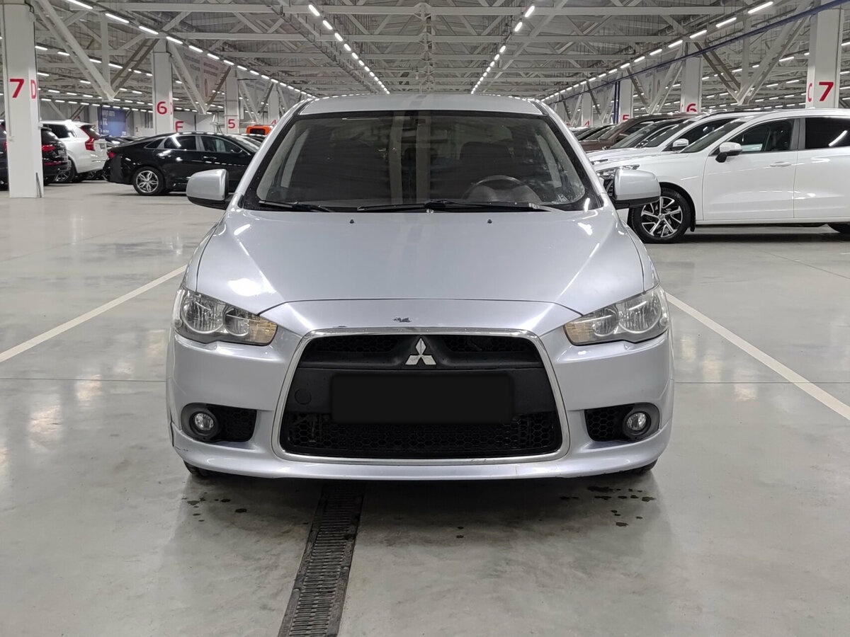 Mitsubishi Lancer с пробегом — 2011 год. Фото: #1