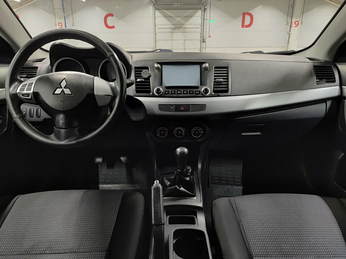 Mitsubishi Lancer с пробегом — 2011 год. Фото: #13